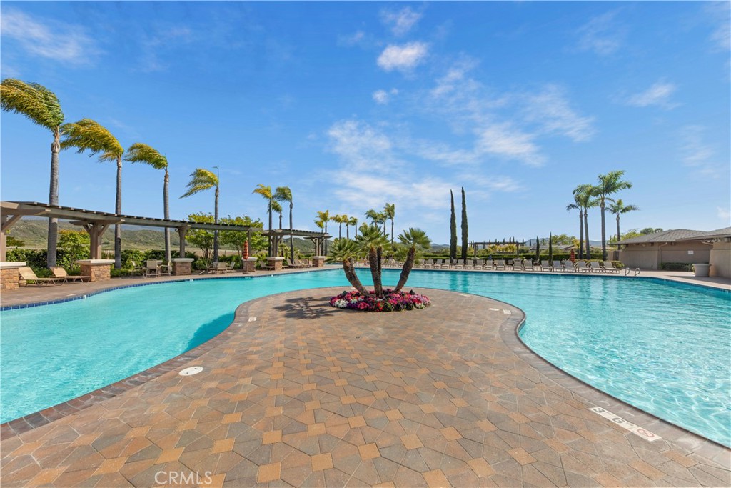 34138 Amici Street Temecula, CA 92592 - Photo 39 of 45 a view of a lake with a house swimming pool and outdoor space