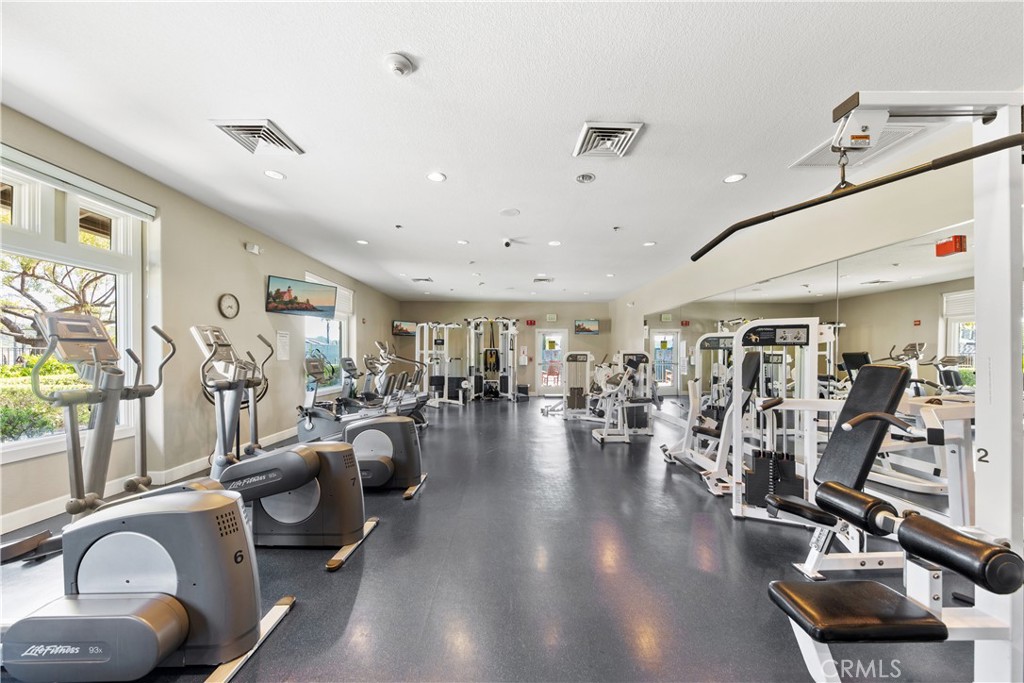 34138 Amici Street Temecula, CA 92592 - Photo 43 of 45 a view of a room with gym equipment