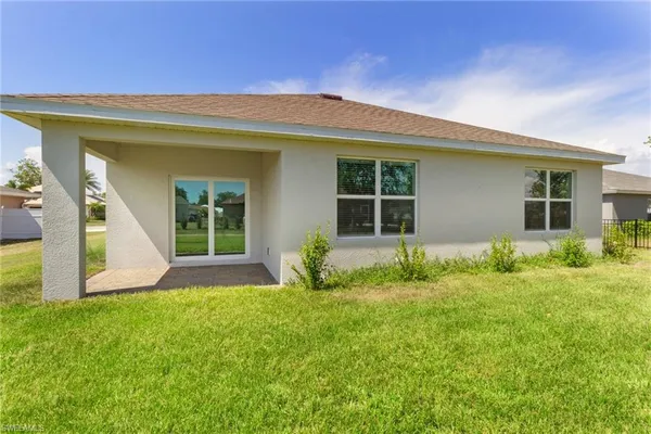 front view of a house with yard