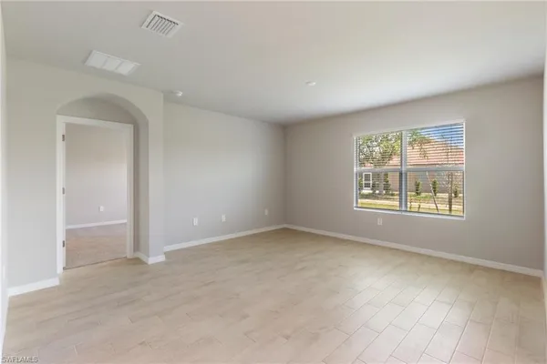 an empty room with windows