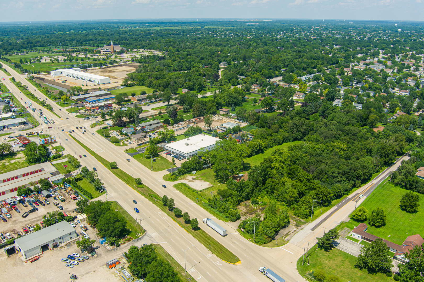 27-w046 North Avenue Carol Stream, IL 60188 - Photo 13 of 16 an aerial view of residential houses with outdoor space and trees