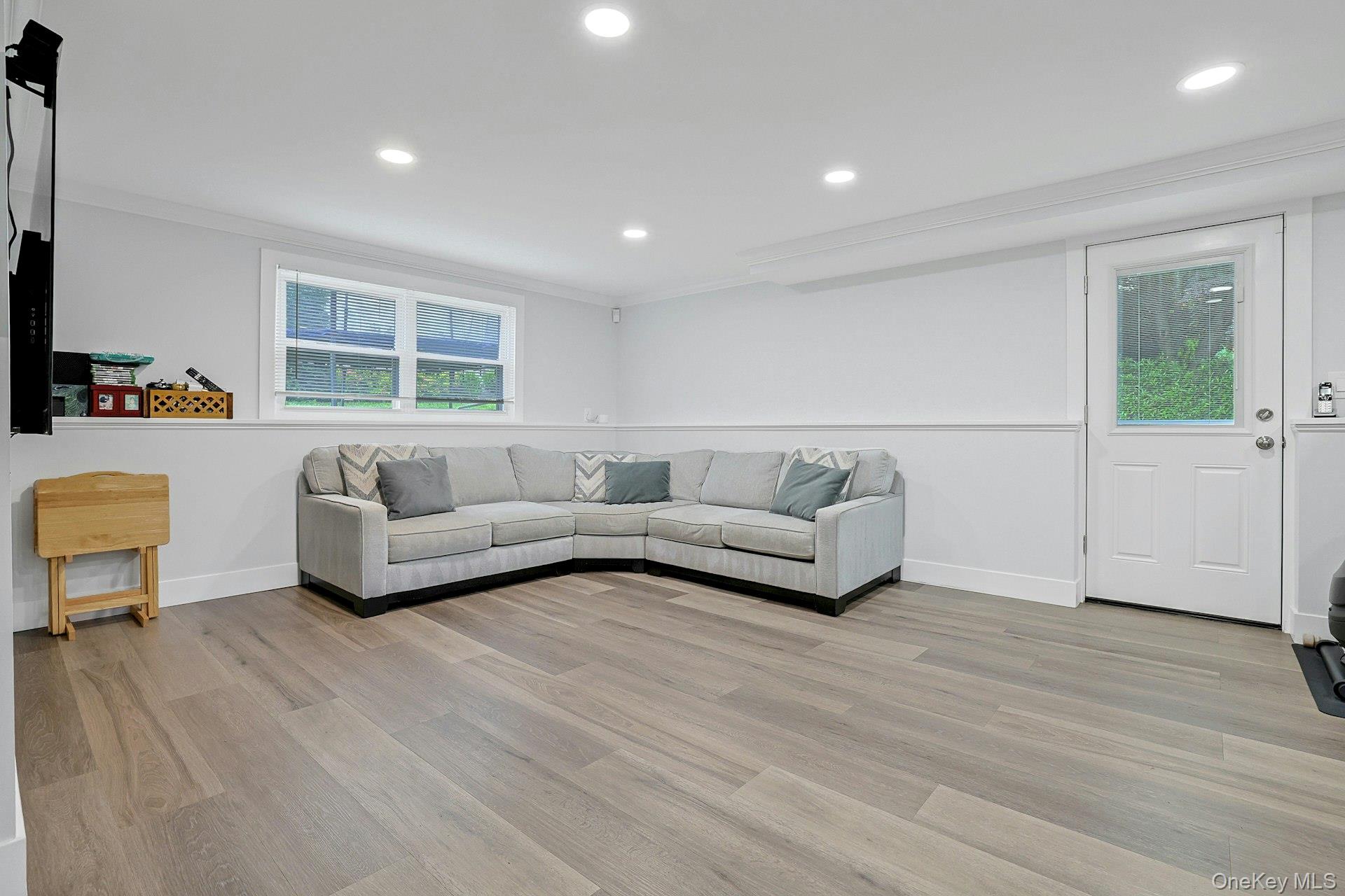 70 Durham Road White Plains, NY 10607 - Photo 23 of 32 Lower Level Family Room with Door to Side Patio