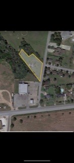 701 Austin Road Eagle Lake, TX 77434 - Photo 2 of 2 a view of backyard with wooden floor