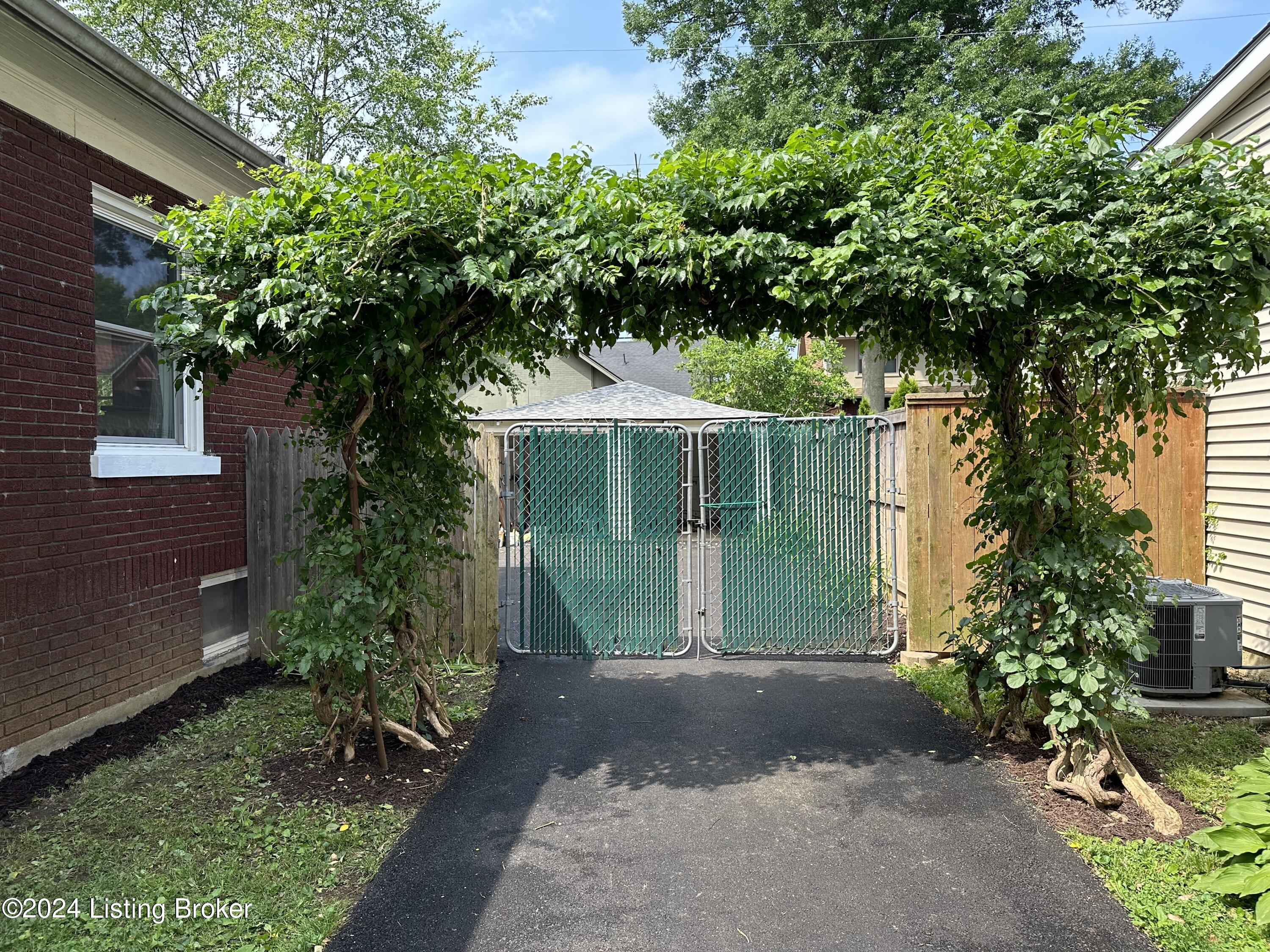 416 Iola Road Louisville, KY 40207 - Photo 26 of 34 Driveway toward Fence