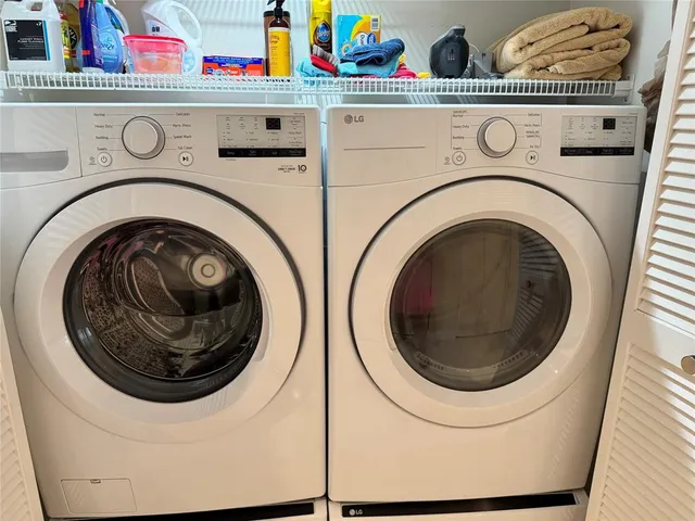 a utility room with dryer and washer