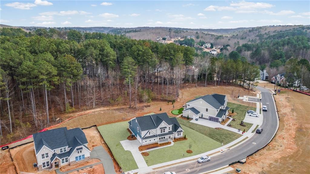 714 Conley Drive Canton, GA 30115 - Photo 2 of 51 a view of a swimming pool with lounge chair