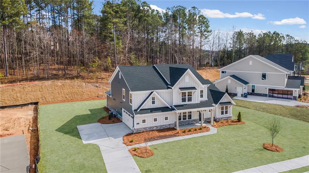 714 Conley Drive Canton, GA 30115 - Photo 3 of 51 an aerial view of a house with swimming pool garden and patio