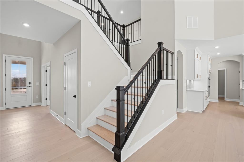 714 Conley Drive Canton, GA 30115 - Photo 32 of 51 a view of a hallway with staircase