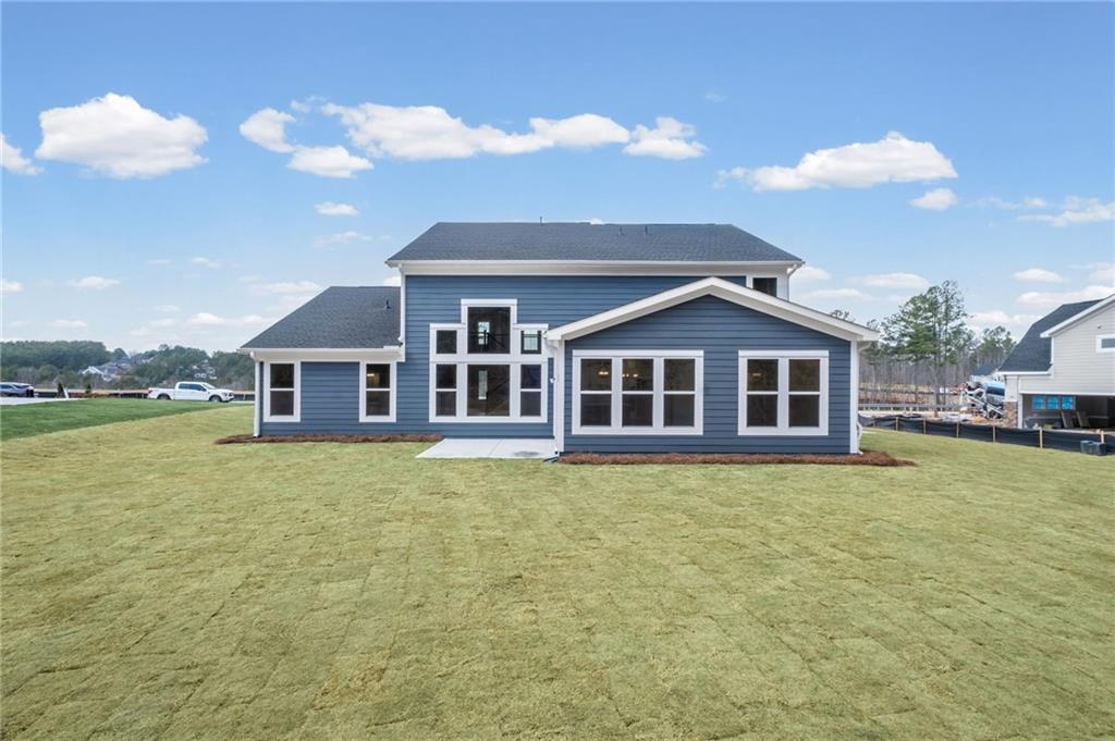 714 Conley Drive Canton, GA 30115 - Photo 43 of 51 a front view of a house with a yard