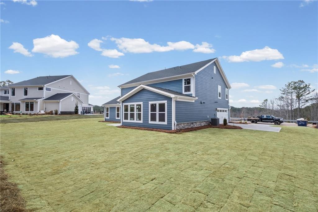 714 Conley Drive Canton, GA 30115 - Photo 45 of 51 a front view of house with outdoor space and swimming pool