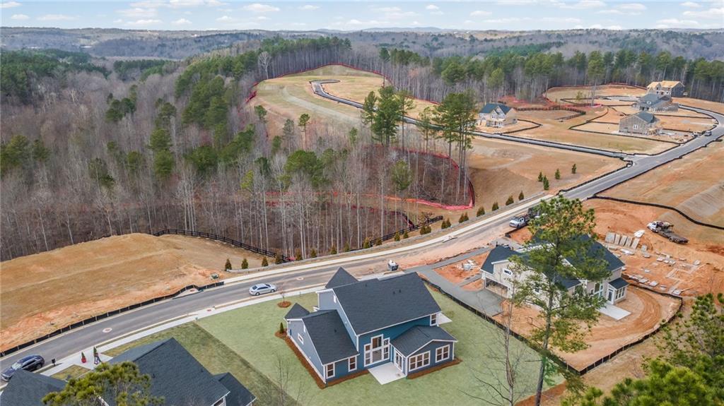 714 Conley Drive Canton, GA 30115 - Photo 47 of 51 a view of a swimming pool with a lake view