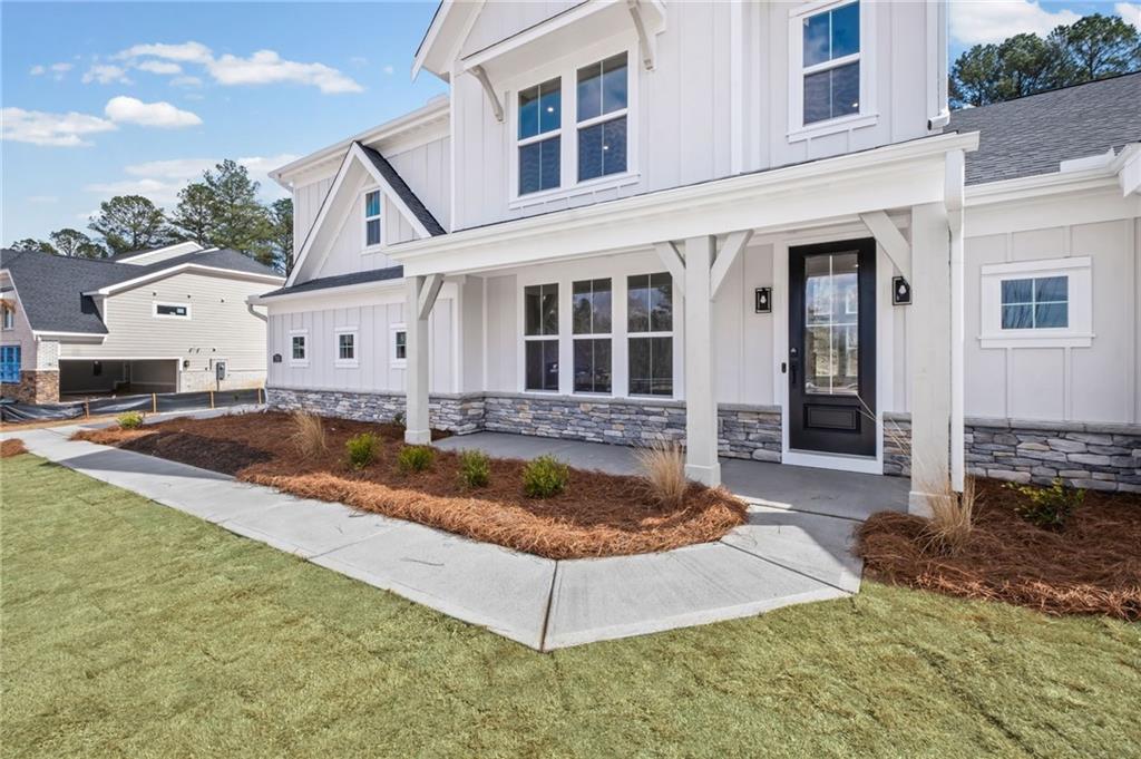 714 Conley Drive Canton, GA 30115 - Photo 6 of 51 a front view of a house with porch