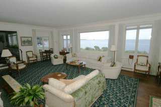 Undisclosed Address Darien, CT 06820 - Photo 6 of 8 a living room with furniture and a large window