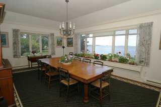 Undisclosed Address Darien, CT 06820 - Photo 7 of 8 a view of a dining room with furniture window and outside view
