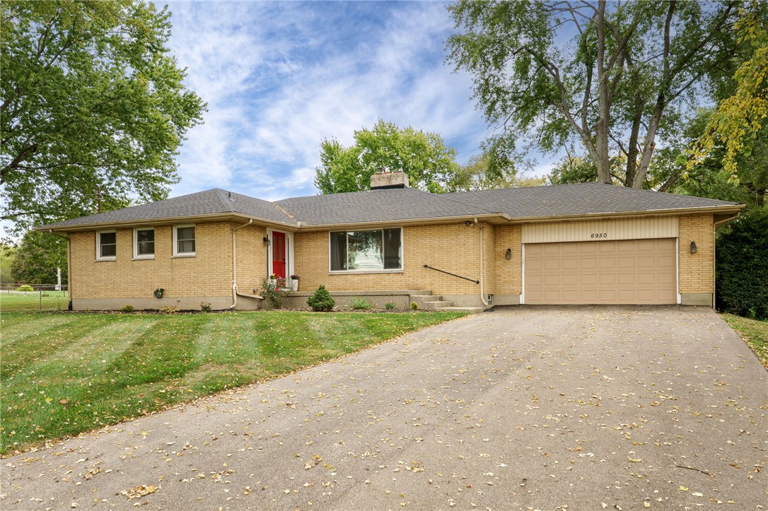 6950 Red Lion 5 Points Road Springboro, OH 45066 - Photo 3 of 78 This charming residence features a well-maintained exterior and a spacious driveway.
