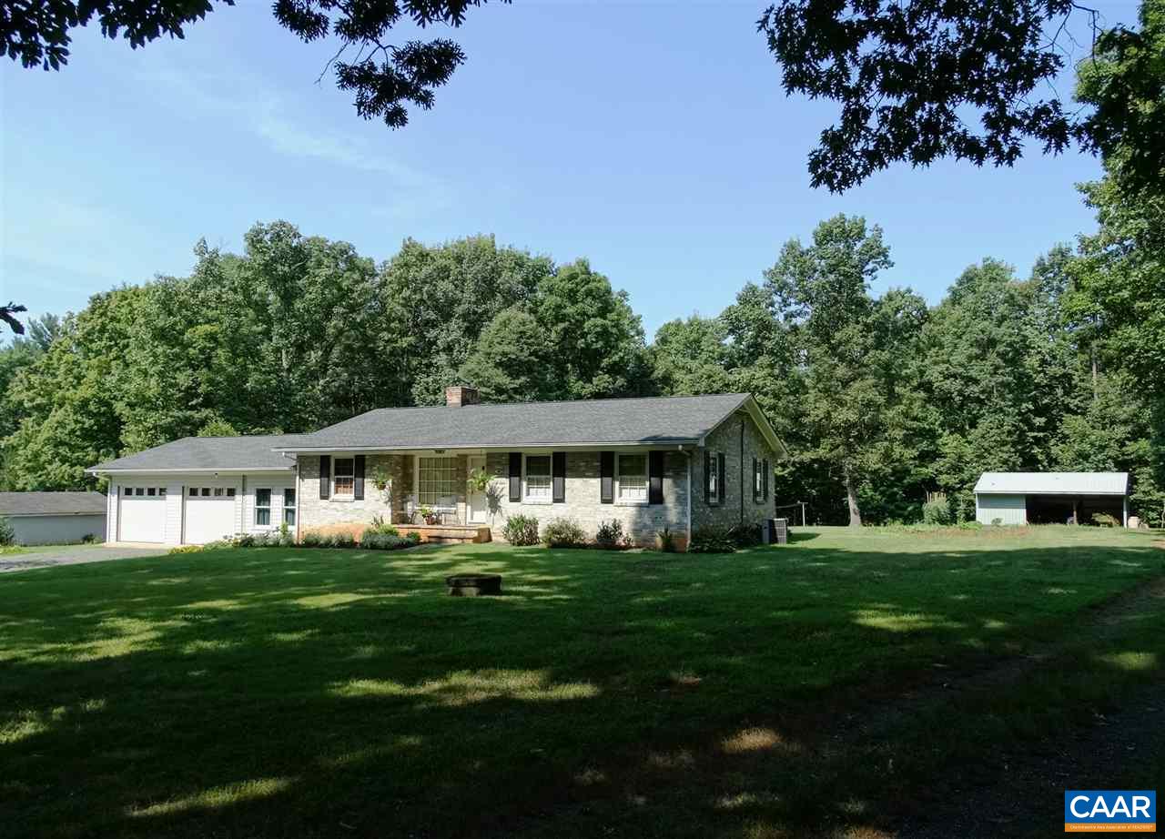 992 Advance Mills Road Ruckersville, VA 22968 - Photo 1 of 34 a front view of a house with garden