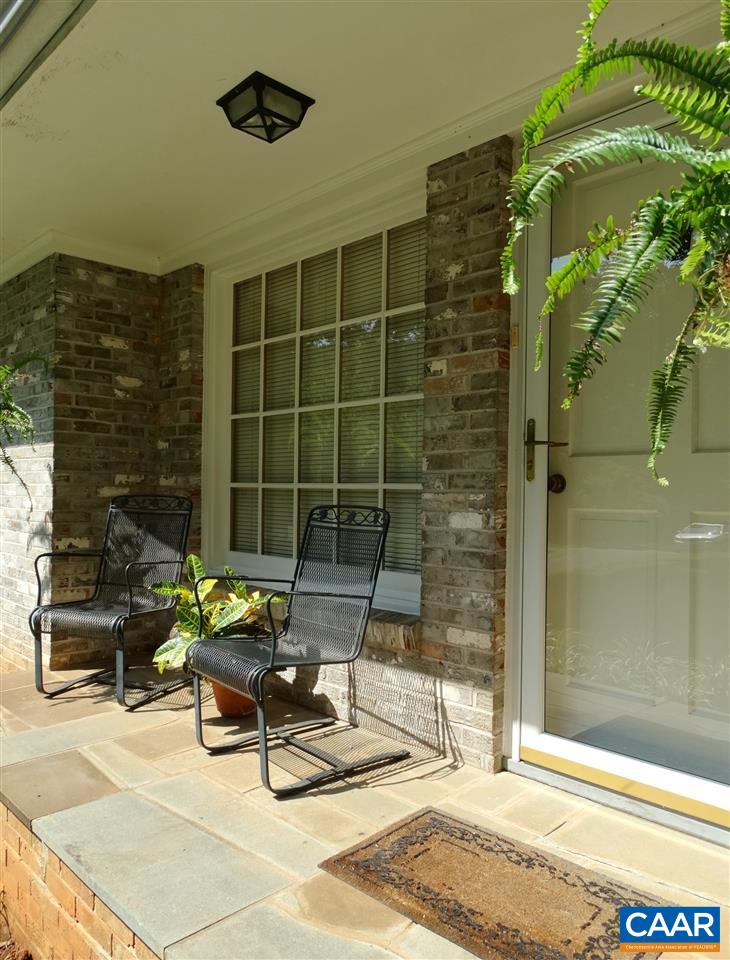 992 Advance Mills Road Ruckersville, VA 22968 - Photo 11 of 34 a building outdoor space with patio furniture and potted plants