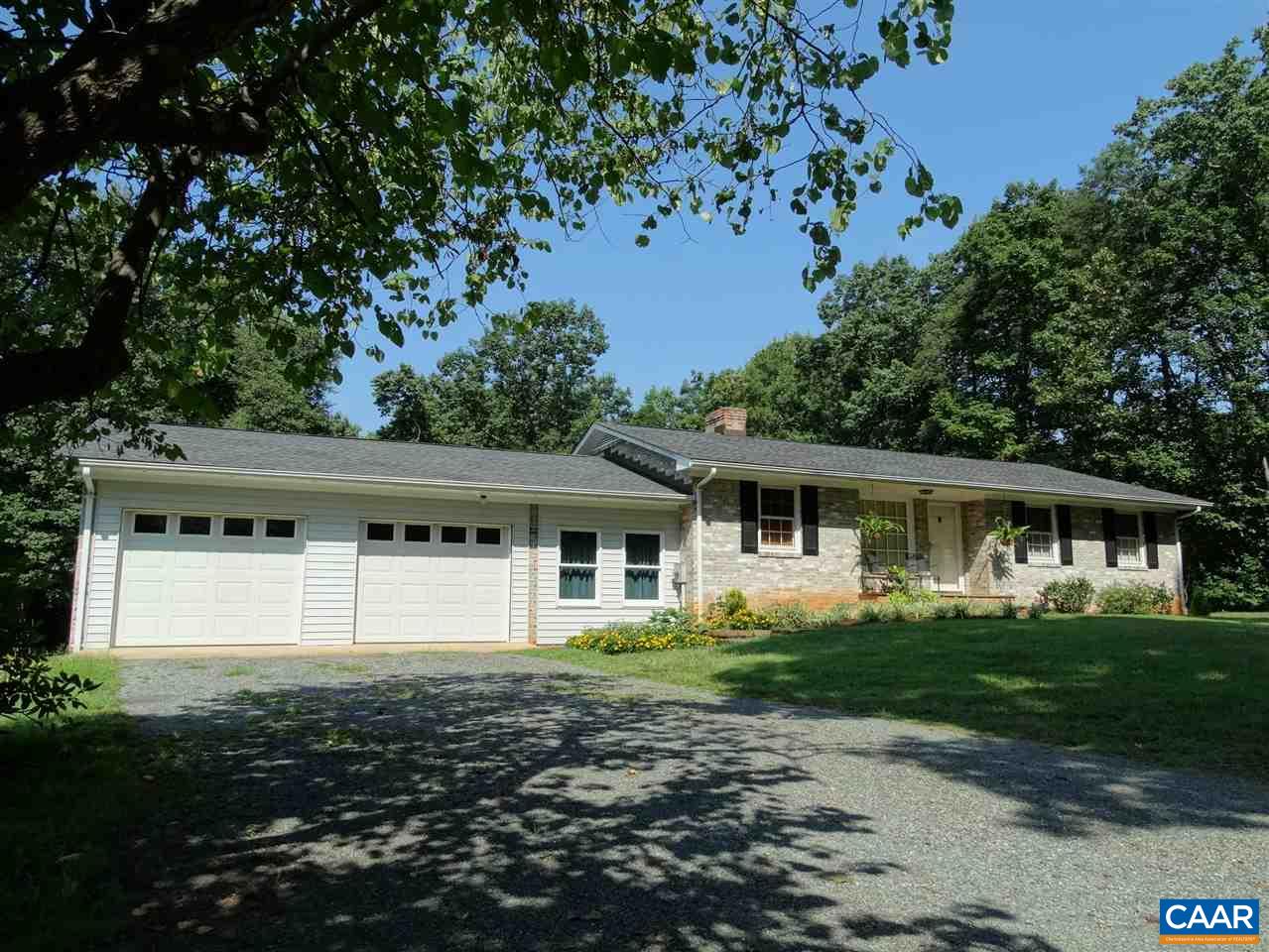992 Advance Mills Road Ruckersville, VA 22968 - Photo 3 of 34 a front view of a house with a yard