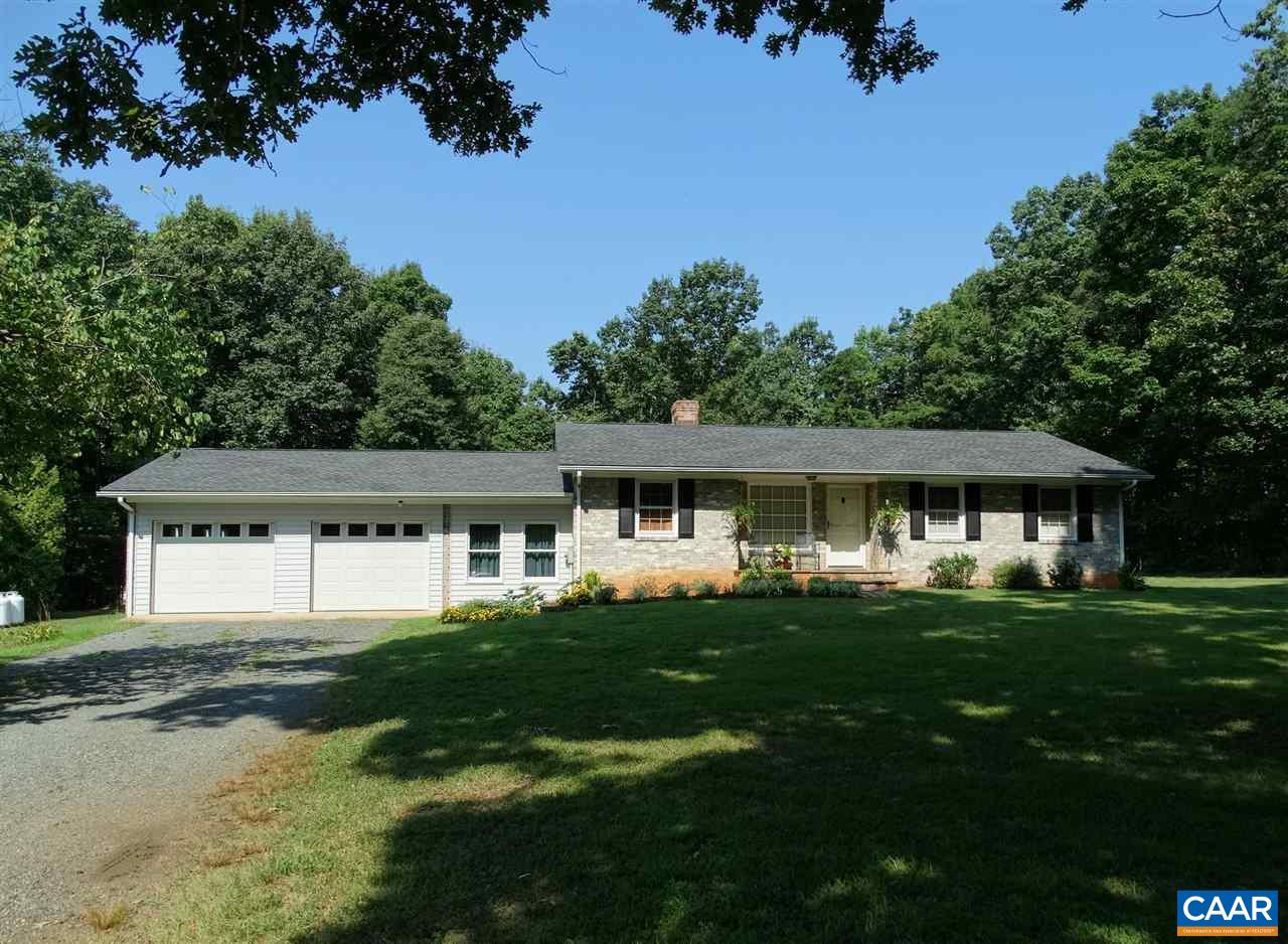 992 Advance Mills Road Ruckersville, VA 22968 - Photo 32 of 34 a house that has a big yard with large trees