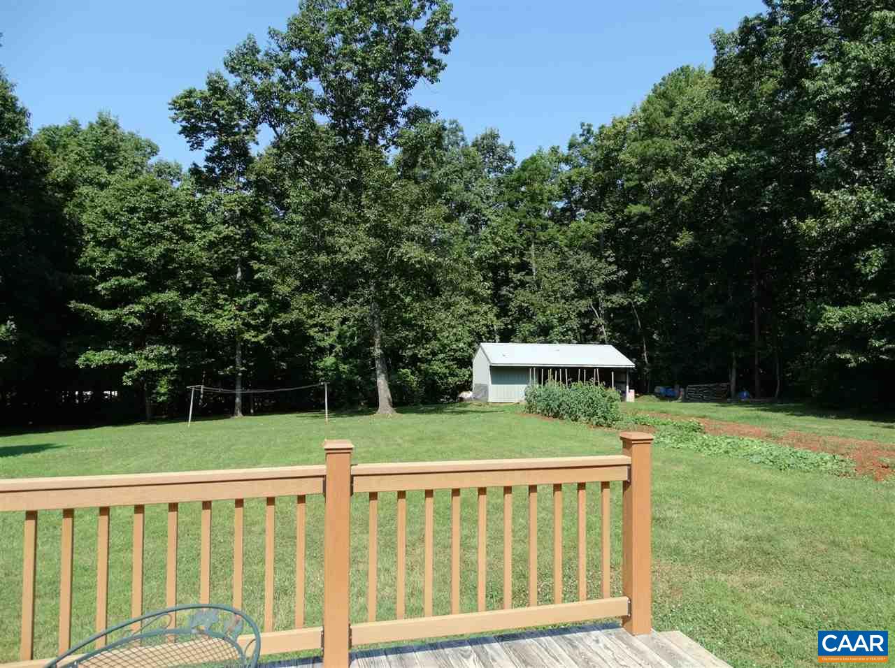 992 Advance Mills Road Ruckersville, VA 22968 - Photo 8 of 34 a view of a wooden deck and backyard