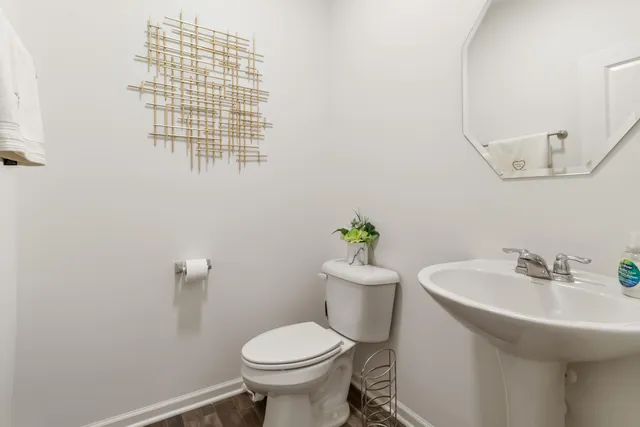 a bathroom with a sink and toilet