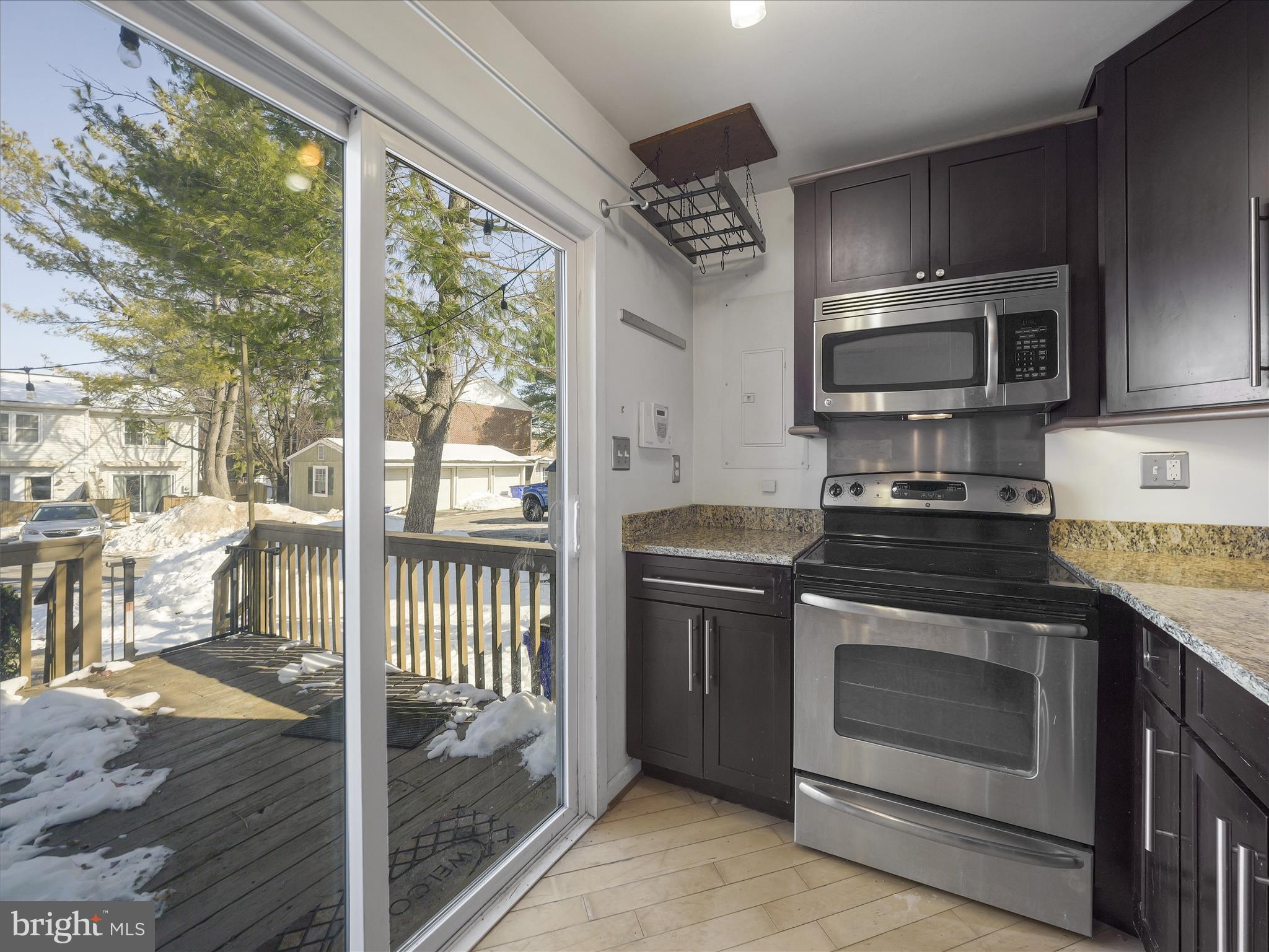 103 East 8th Street, Unit F Frederick, MD 21701 - Photo 12 of 32 Slider From Kitchen To Rear Deck