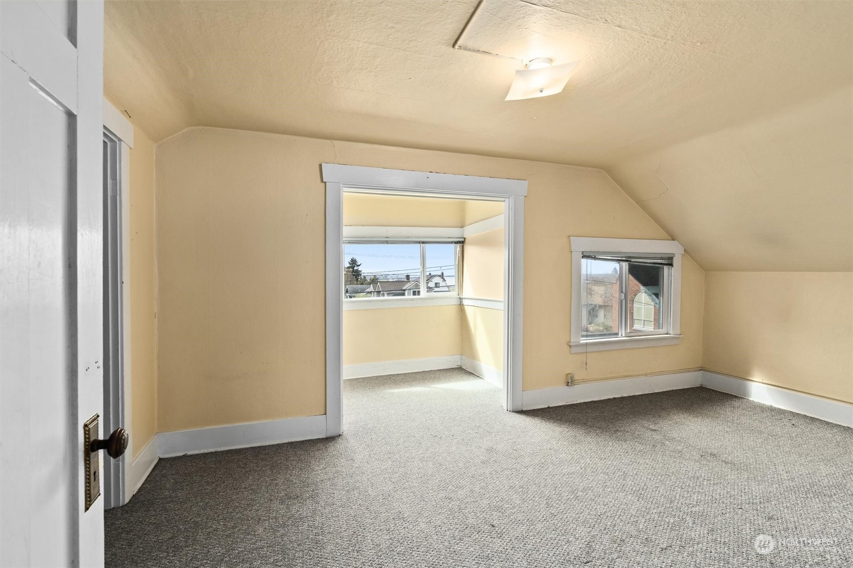 2813 15th Avenue South Seattle, WA 98144 - Photo 15 of 32 a view of an empty room with a window