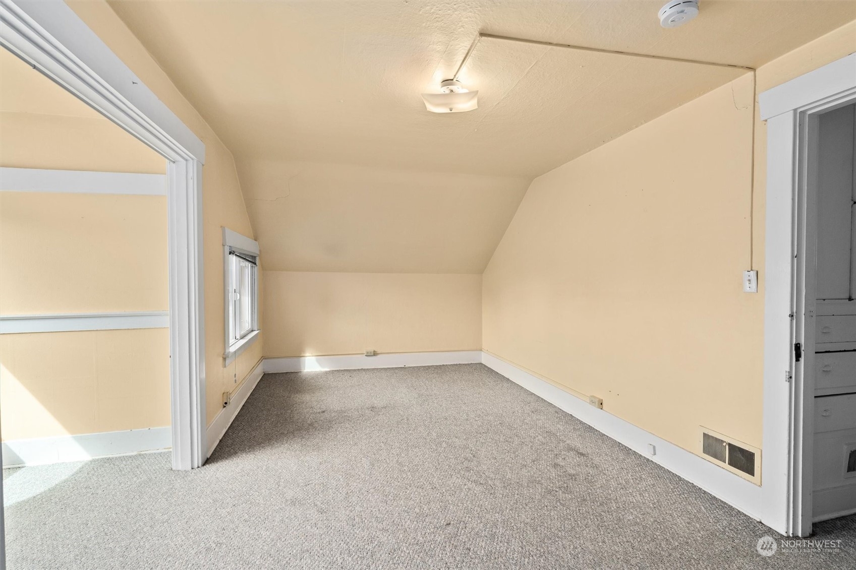 2813 15th Avenue South Seattle, WA 98144 - Photo 17 of 32 a view of a big room with closet and windows