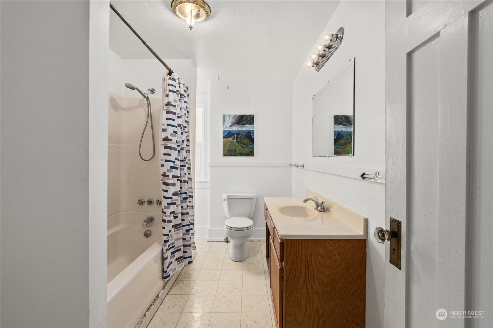 2813 15th Avenue South Seattle, WA 98144 - Photo 22 of 32 a bathroom with a sink a toilet and shower