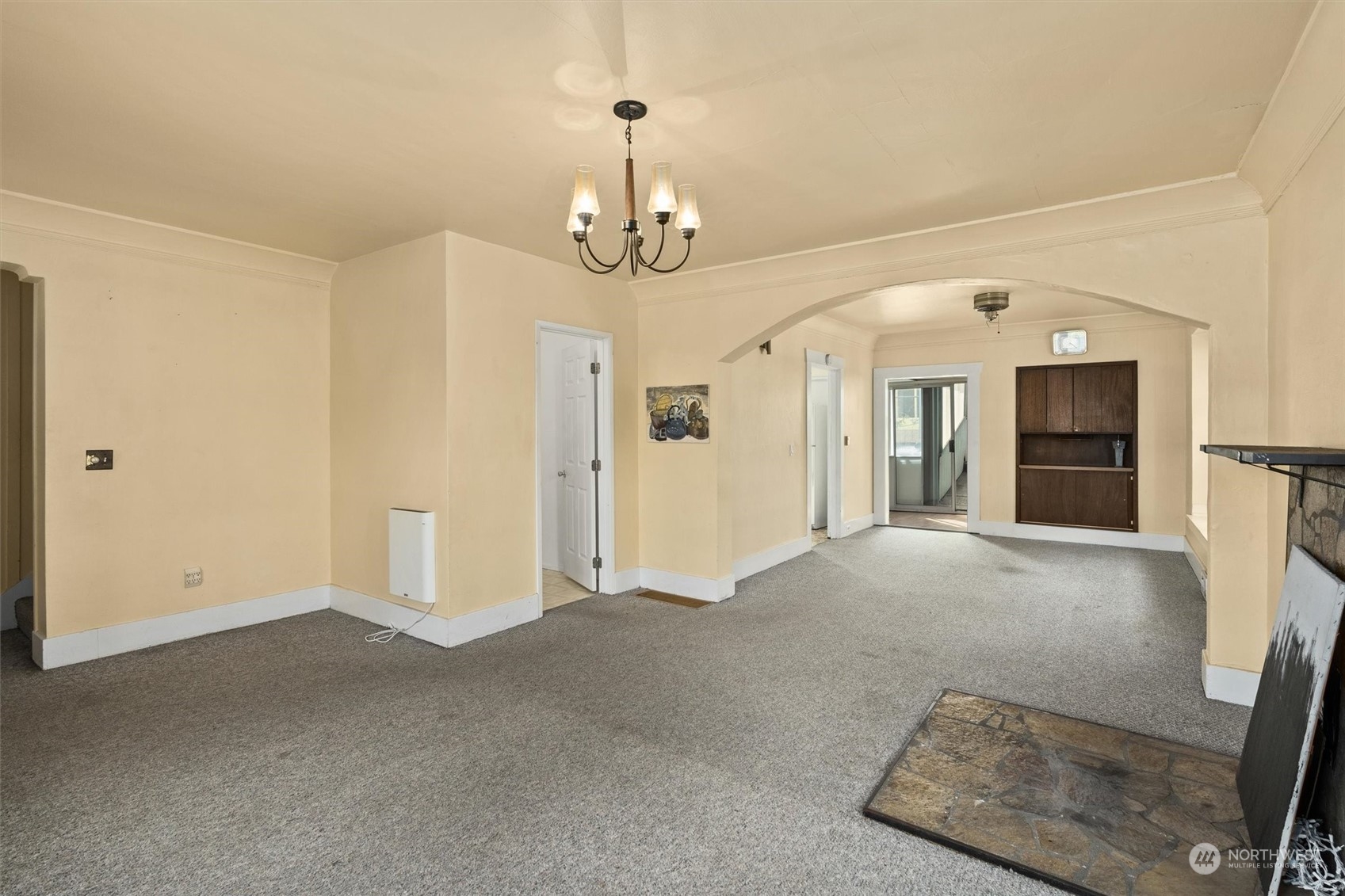 2813 15th Avenue South Seattle, WA 98144 - Photo 7 of 32 a view of a livingroom with a chandelier
