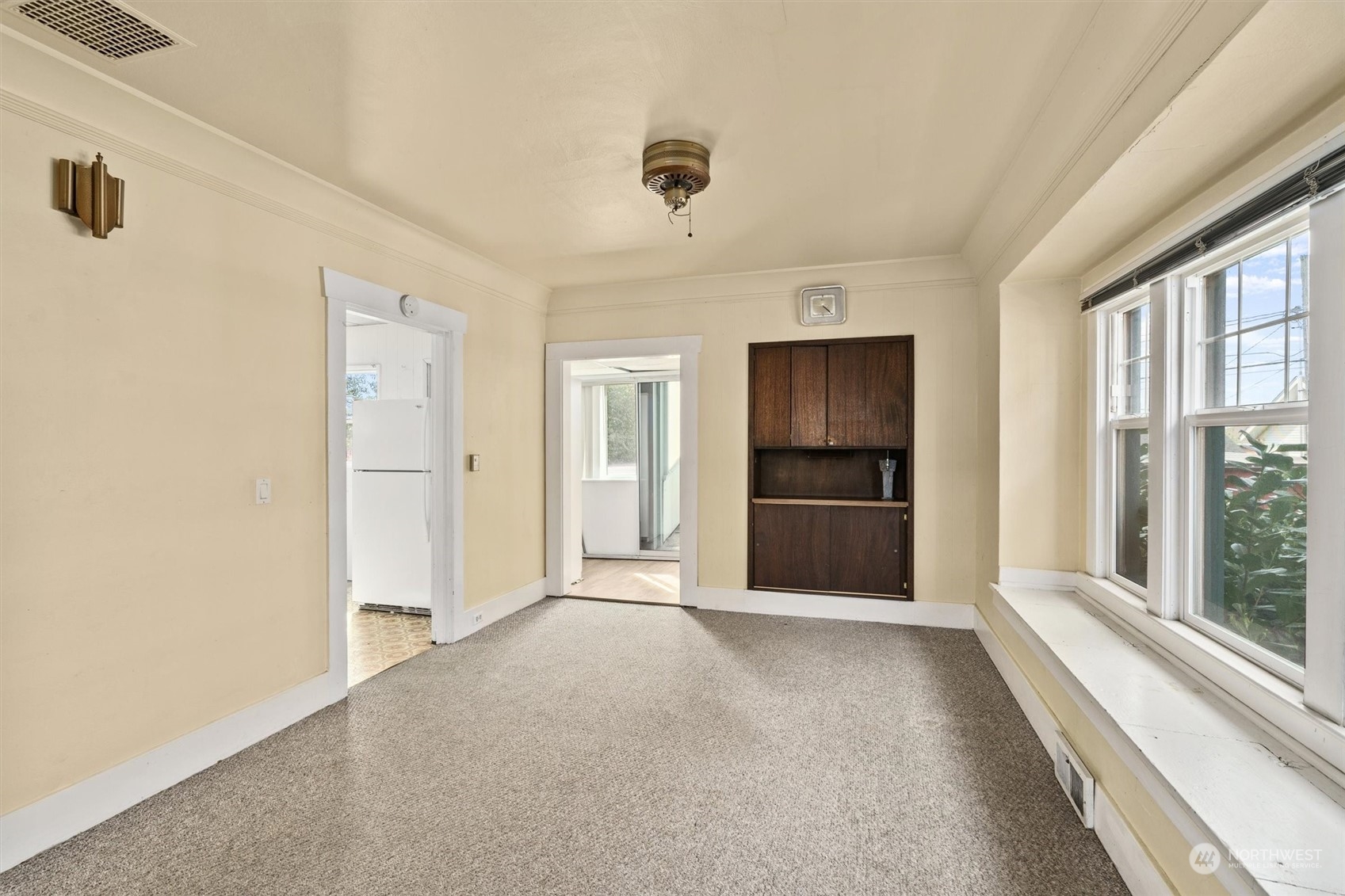 2813 15th Avenue South Seattle, WA 98144 - Photo 9 of 32 a view of a hallway with an empty room and a window