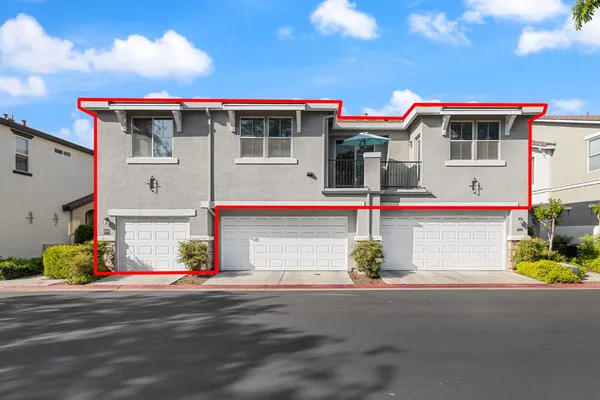 a front view of a house with street