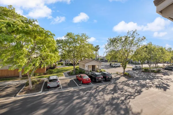 a view of a cars in front of a house