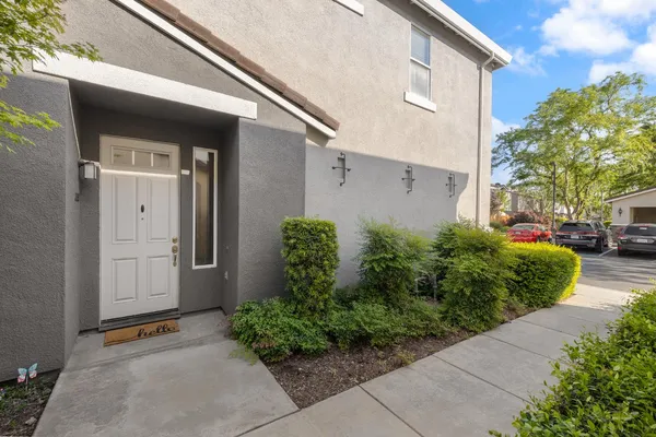 a view of a back yard of the house