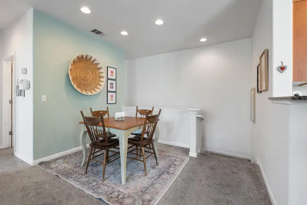 a view of a dining room with furniture