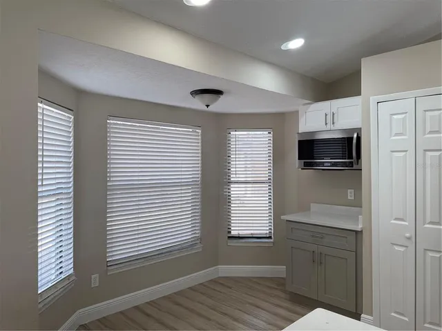 a view of kitchen and microwave area