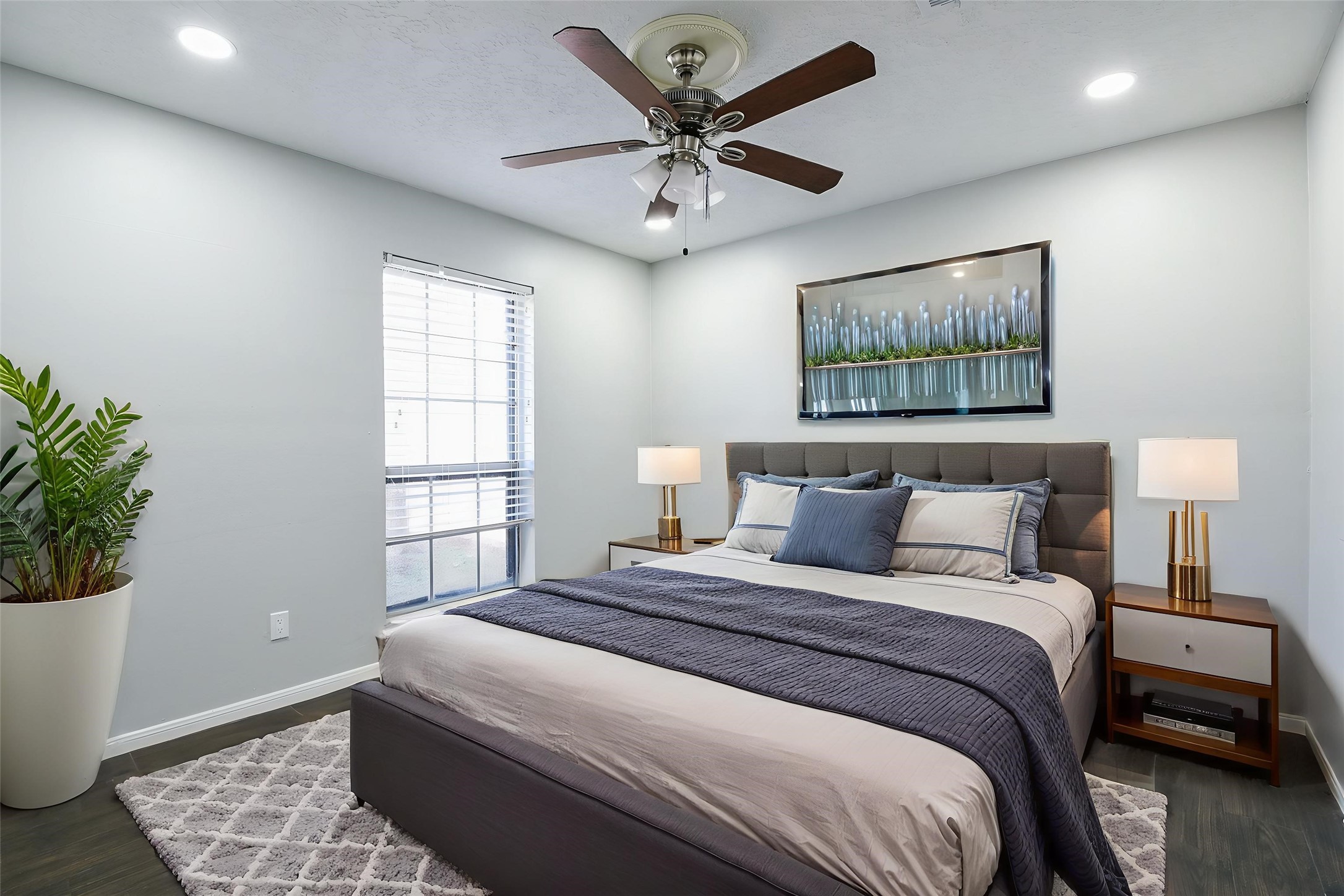 1007 Maranon Lane Houston, TX 77090 - Photo 19 of 36 Beautiful wood-like tile flooring enhances this area! Recessed lighting provides bright illumination for working from home!