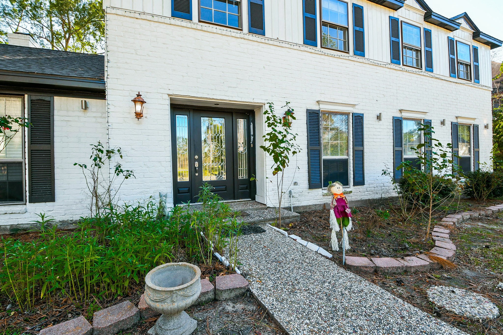 1007 Maranon Lane Houston, TX 77090 - Photo 2 of 36 Notice the excellent curb appeal and the walkway leading to the gorgeous front door.
