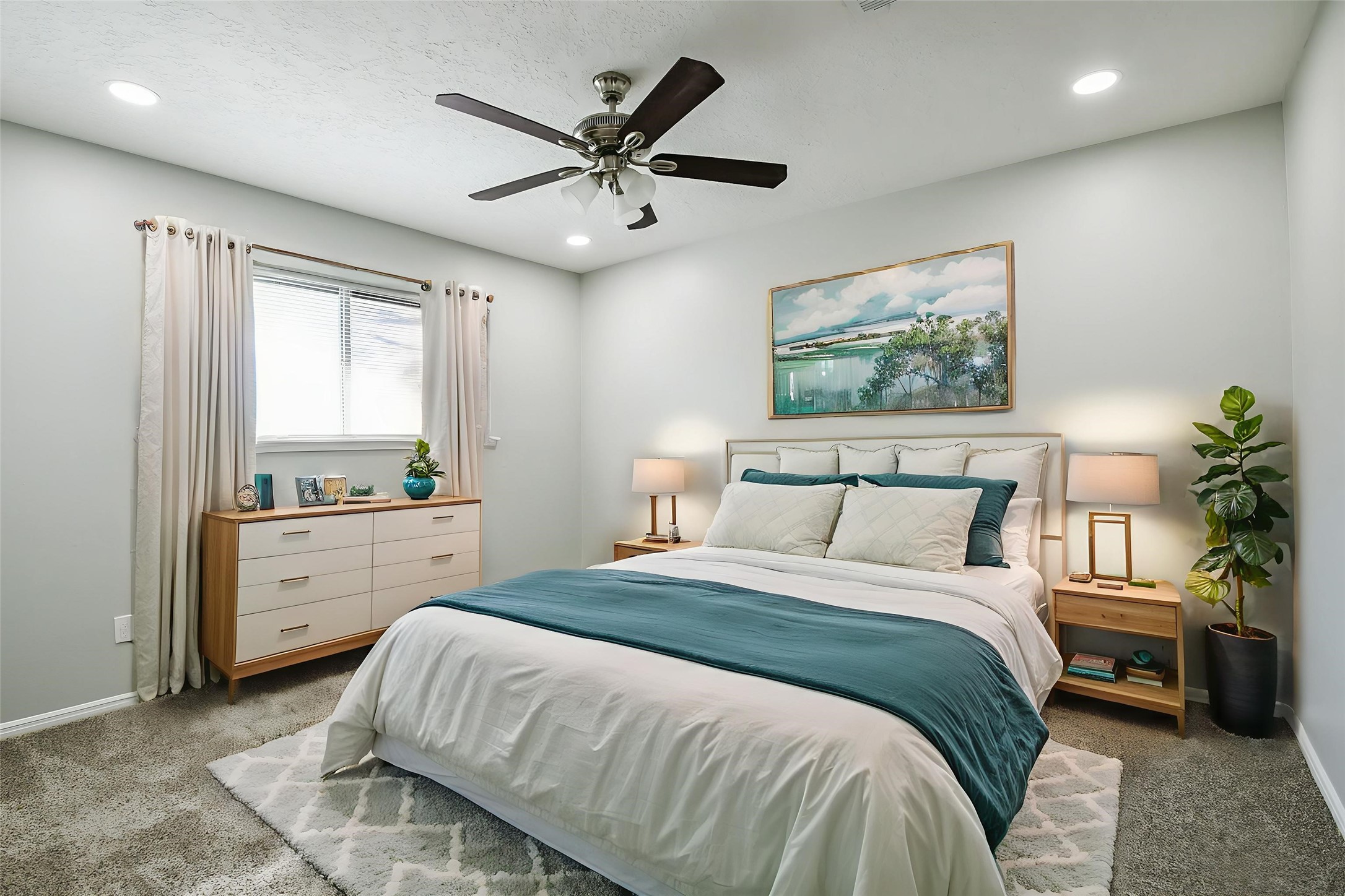 1007 Maranon Lane Houston, TX 77090 - Photo 27 of 36 The third bedroom continues the design and style of the other bedrooms located upstairs.