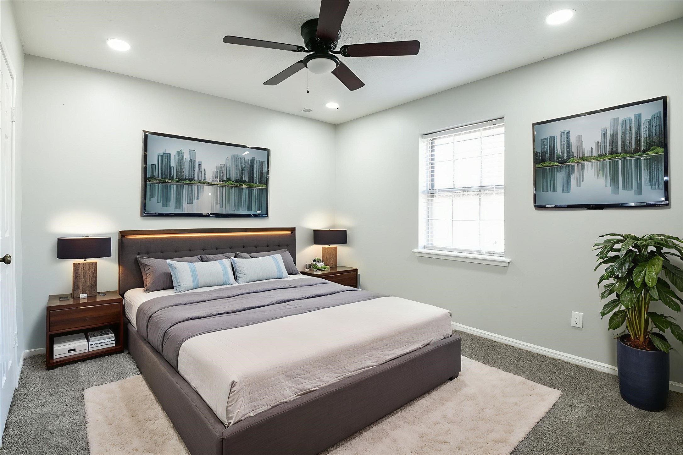 1007 Maranon Lane Houston, TX 77090 - Photo 28 of 36 The fourth bedroom, like the other bedrooms, features newly installed carpet, fresh paint, recessed lighting, and a modern ceiling fan. These updates are designed to enhance comfort during warm afternoons.