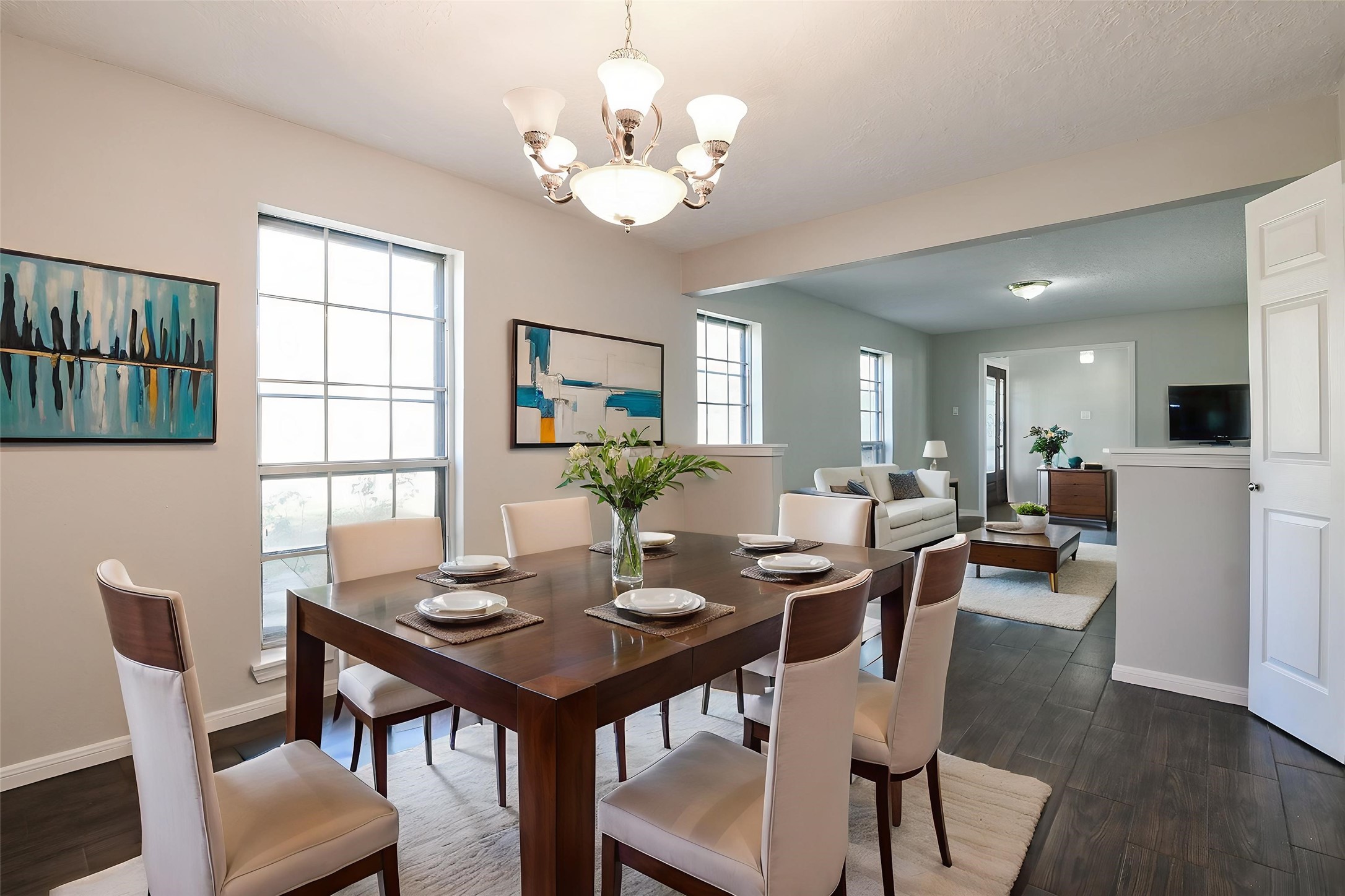 1007 Maranon Lane Houston, TX 77090 - Photo 7 of 36 Discover the formal dining with a gorgeous light fixture that hangs above.