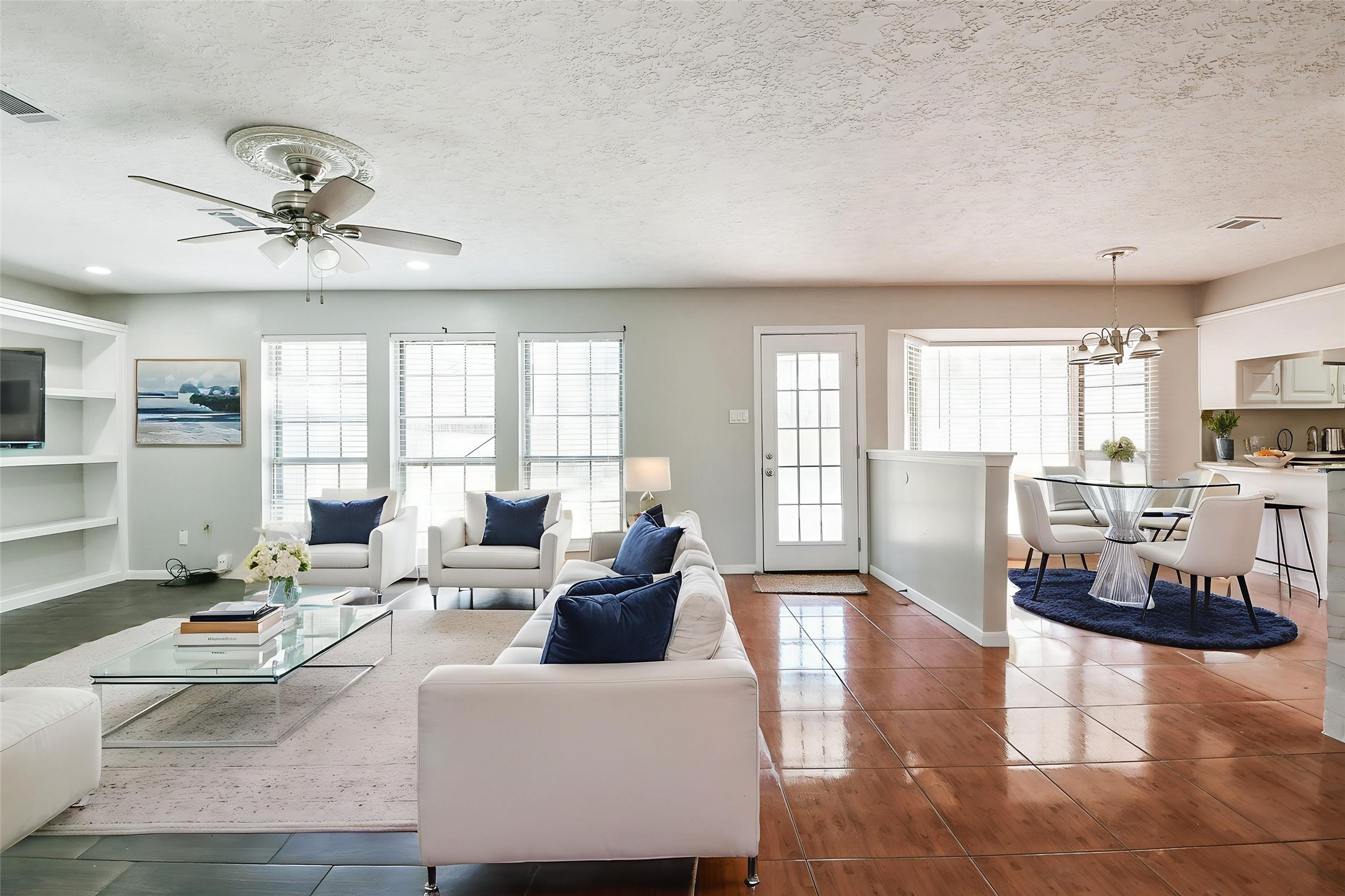 1007 Maranon Lane Houston, TX 77090 - Photo 10 of 36 Notice the contrast of the dark to light flooring, giving the home a modern and classic look.