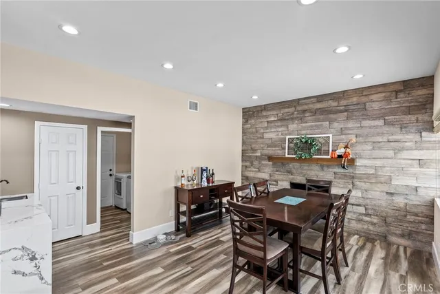 a view of a dining room with furniture