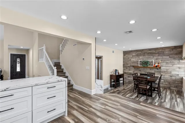 a view of a living room and dining room