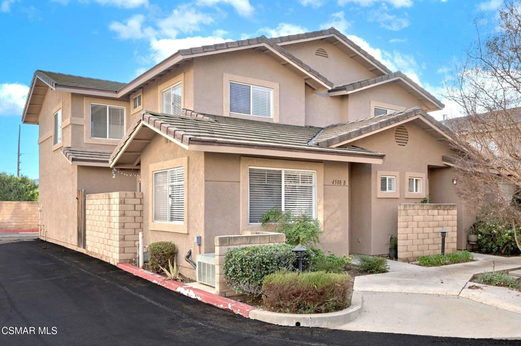 4508 Apricot Road, Unit B Simi Valley, CA 93063 - Photo 1 of 44 a view of a white house with a sink and a yard