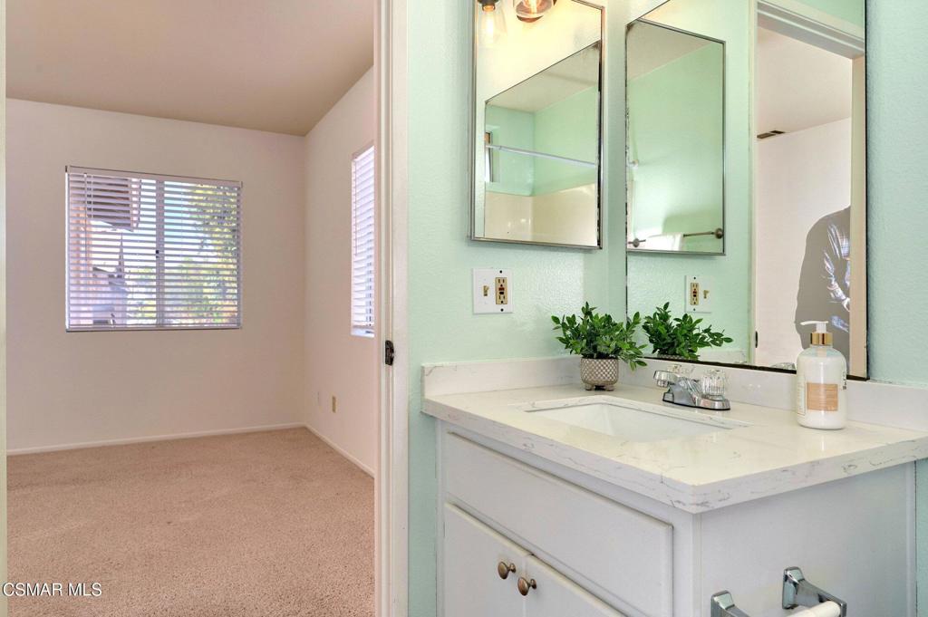 4508 Apricot Road, Unit B Simi Valley, CA 93063 - Photo 24 of 44 a bathroom with a sink and a mirror
