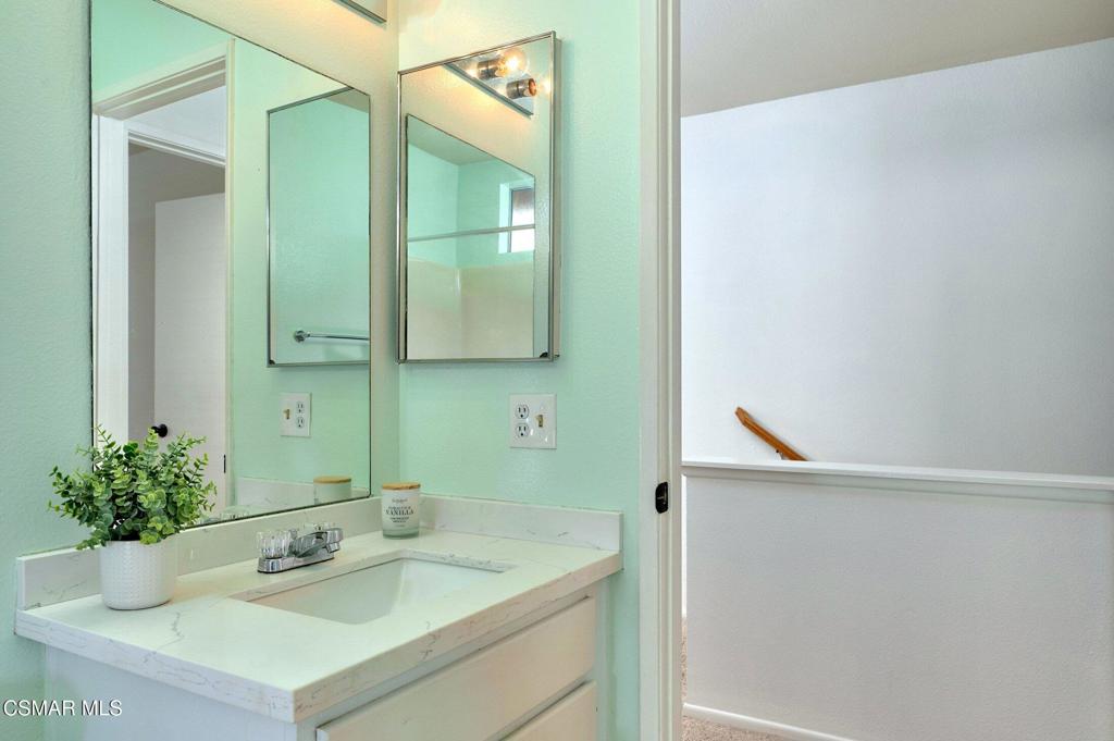 4508 Apricot Road, Unit B Simi Valley, CA 93063 - Photo 29 of 44 a bathroom with a sink and a mirror