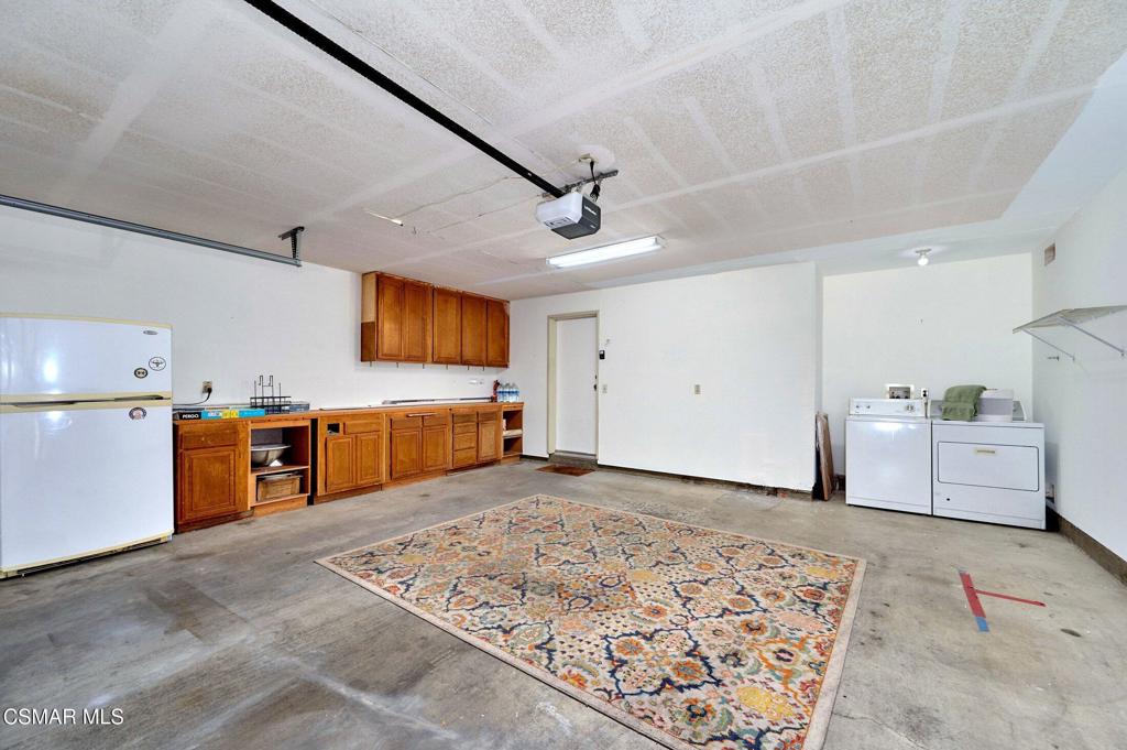 4508 Apricot Road, Unit B Simi Valley, CA 93063 - Photo 34 of 44 a view of a kitchen with stainless steel appliances wooden floor and a sink