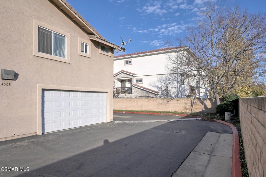 4508 Apricot Road, Unit B Simi Valley, CA 93063 - Photo 41 of 44 a view of a house with a snow on the road