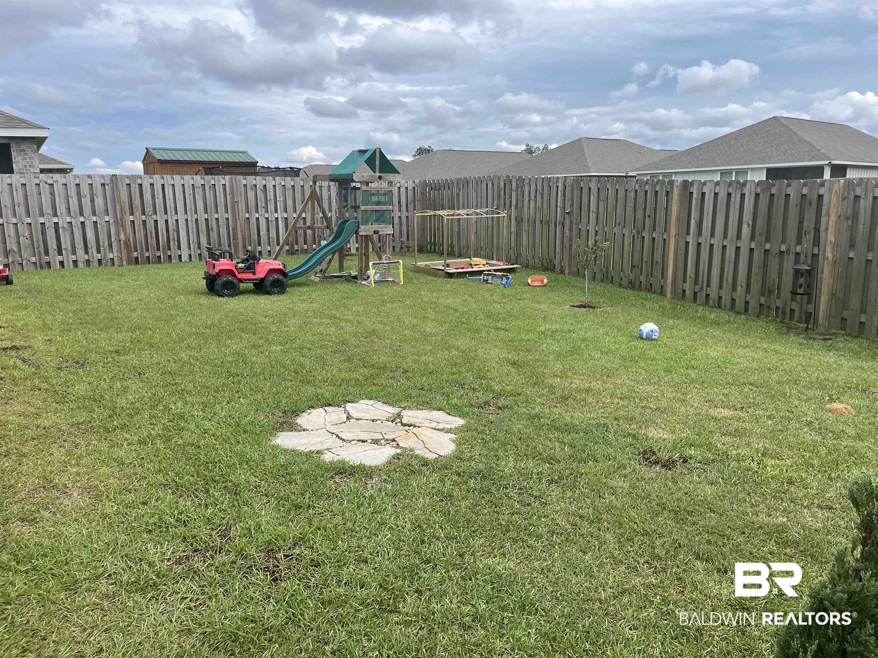 7952 Irwin Loop Daphne, AL 36526 - Photo 17 of 22 View of yard with a playground